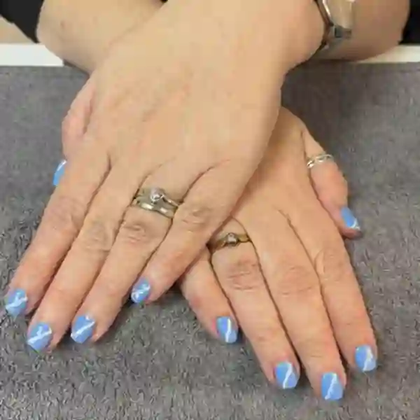 Blue gel nail design